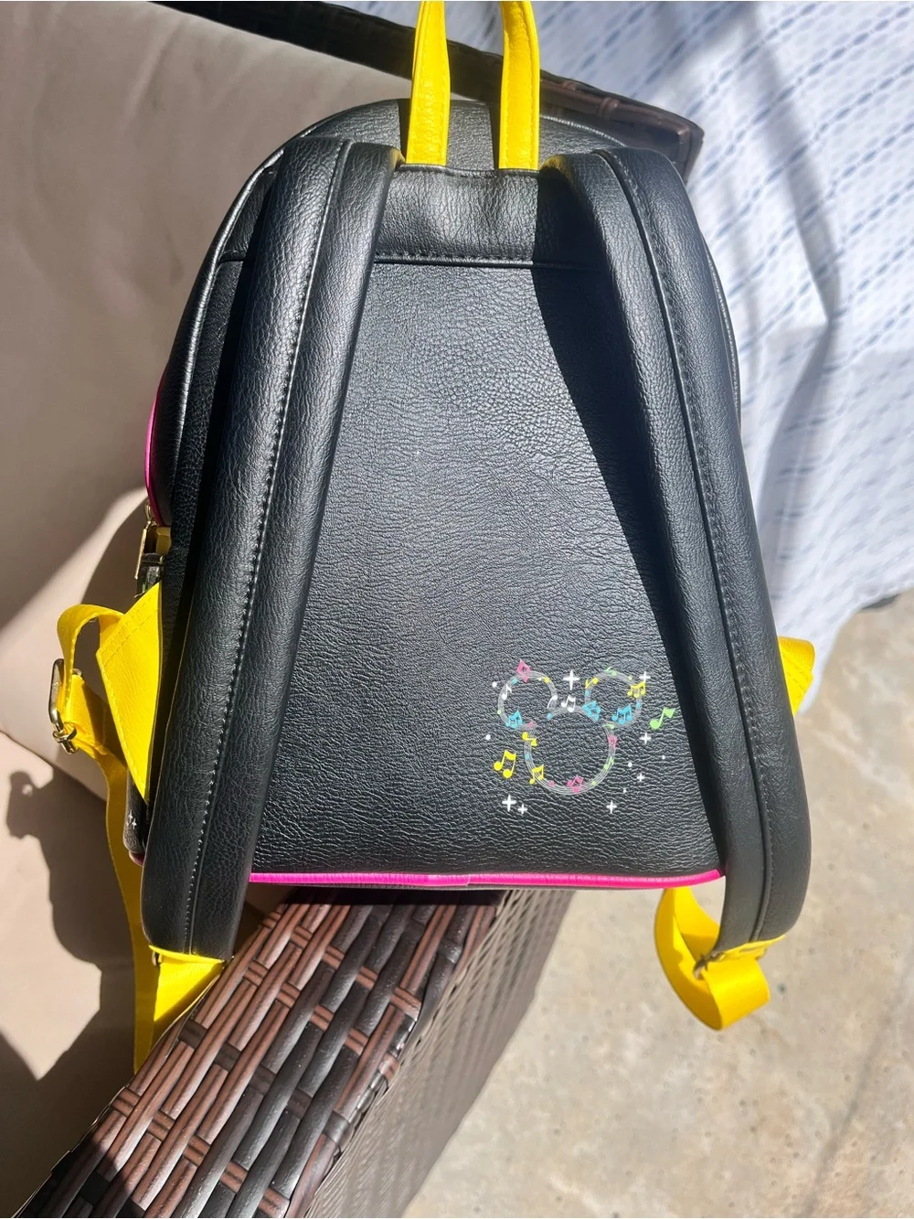 Disney Black Mini Backpack with Yellow Straps and Colorful Mickey Fantasy Print